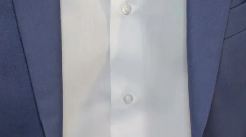The man sit down and straightens his tie. Close up 스톡 동영상 64233415