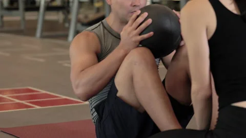 Man sit-up with med ball Stock Footage 181330092