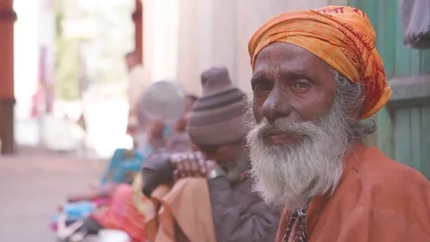 Man siting outside the temple Stock Footage 77454462