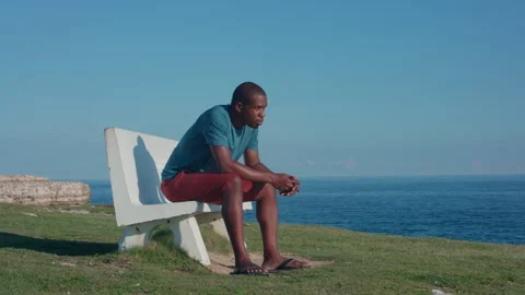 Man sits and thinks Stock Footage 287154024