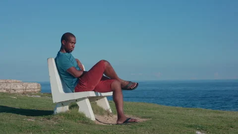 Man sits and thinks Stock Footage 287154592