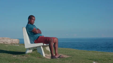 Man sits and thinks Stock Footage 287155206