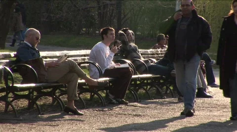 Man sits and writes in Central Park 库存影片 455074