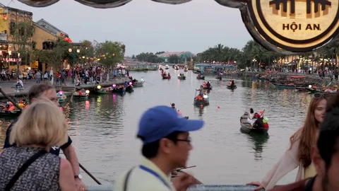 A man sits in a boat and controls it Stock Footage 128277370