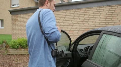 A man sits in the car Stock Footage 66347034
