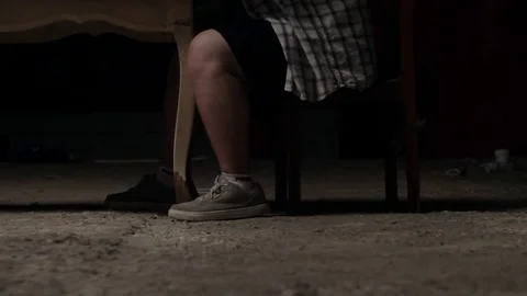 Man sits on a chair close-up Stock Footage 71575576