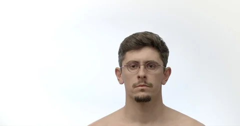 Man sits down and throws his shirt isolated on white background Stock Footage 128488309