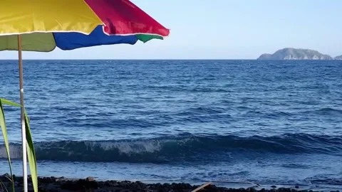 A man sits down on the ocean. Video stock 138075605
