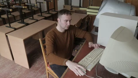 Man Sits In Front Of Old-fashioned Computer In Office 1980S, 1990S Stock Footage 316149350