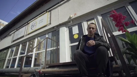 Man sits on the porch Stock-Footage 72105646