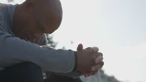 Man Sits Praying In Morning Stock Footage 208740811
