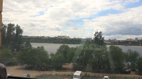 A man sits at a table and picks up jewelry and jewelry Stock Footage 130941244
