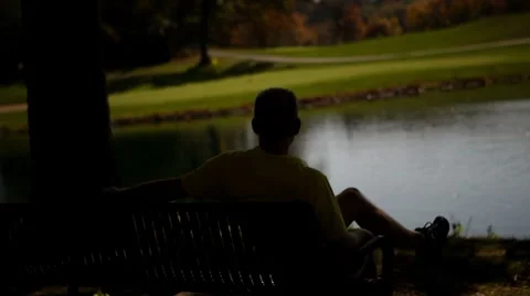 Man Sits in Thinking Video stock 8830958
