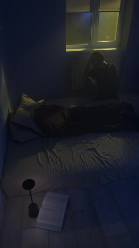 Man sitting alone on bed after relationship breakup, emotional pain and Stock Footage 320247389