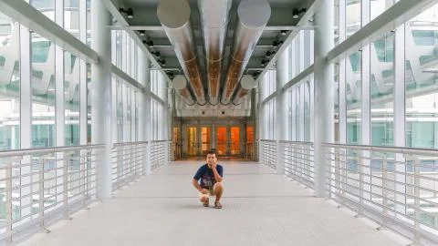 A man sitting alone on the Concourse 스톡 사진