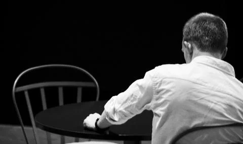 A man sitting alone Stock Photos