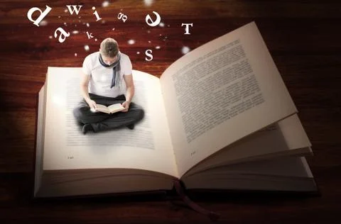 Man sitting and reading inside book Stock Photos