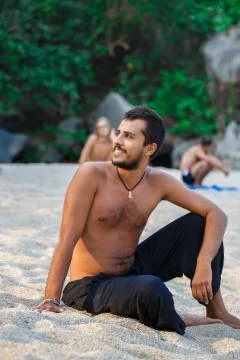 Man sitting on a beach Foto stock