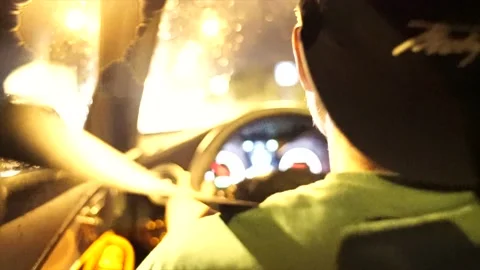 A man is sitting behind the wheel of a car. Stock Footage 150108643