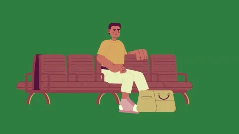 A man sitting on bench with bag and in front of green background screen green Stock Footage 337340964