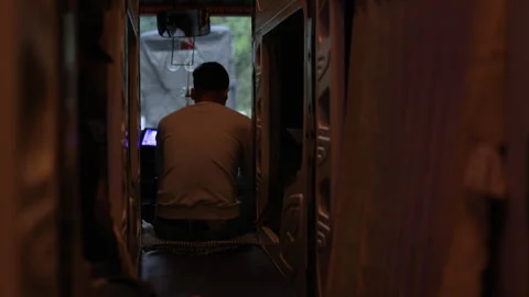 Man is sitting in bus aisle. Stock Footage 305370410