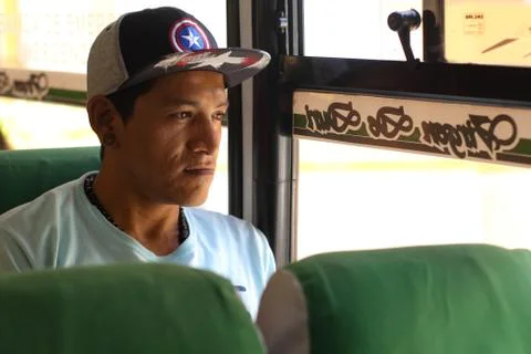 Man Sitting in Bus Stock Photos