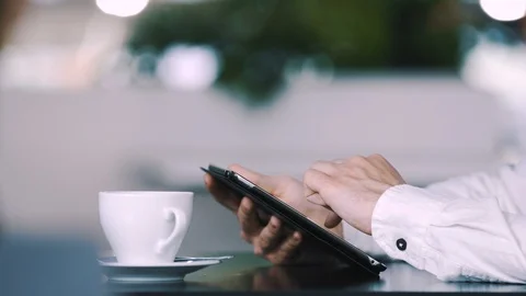 Man sitting in cafe Stock Footage 97075692