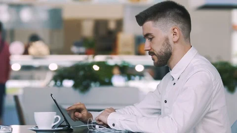 Man sitting in cafe Video stock 97084081
