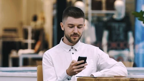 Man sitting in cafe Stock Footage 97094498