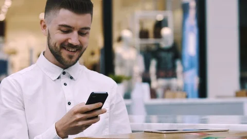 Man sitting in cafe Stock Footage 97099220