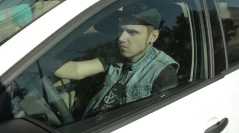 The man sitting in the car. Stock Footage 51756822