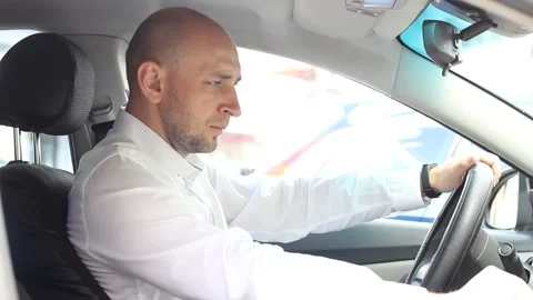 A man sitting in a car Video stock 135607371