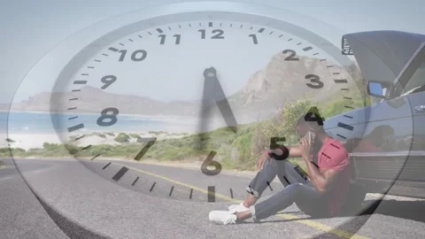 Man sitting by car, using phone while clock hands overlay rotating over him, Vídeos de archivo 330793684