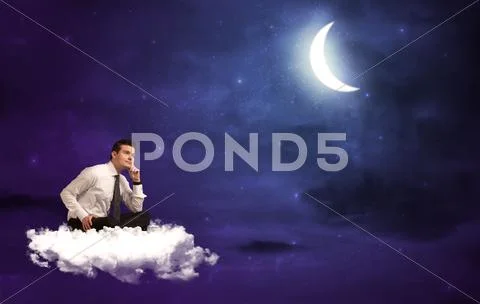 Man sitting on cloud Stock Photos
