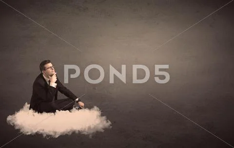 Man sitting on a cloud with plain background Stock Photos