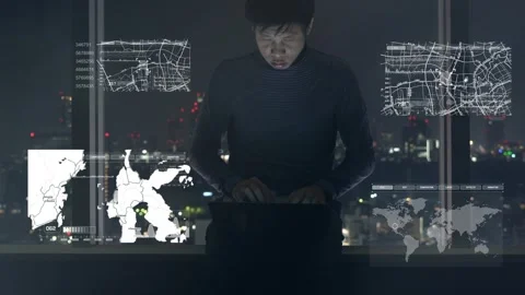 A man is sitting on a couch and using a tablet Stock Footage 314899488