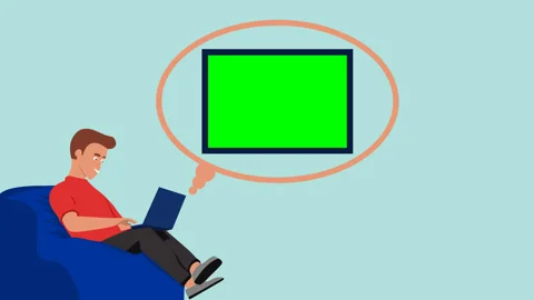 Man is sitting on the couch playing laptop casually Or Man Work at Home Stock Footage 244939048