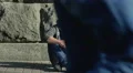 The man sitting by the crowd stream. Real time capture. 4K resolution 4k or 4k+ Resolution