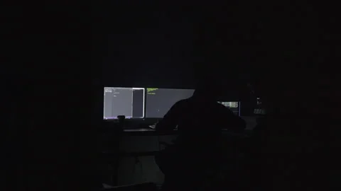 Man Sitting in the Dark and Coding Stock Footage 208746081