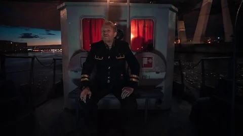 Man Sitting On A Deck Stock Footage 75443007