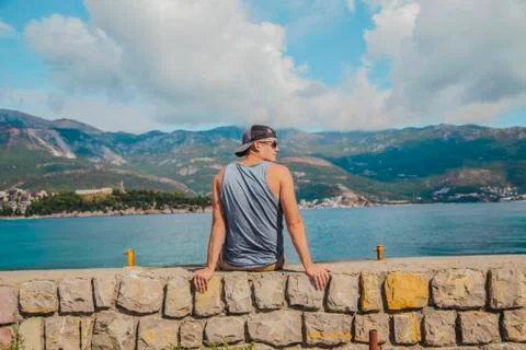 The man is sitting on the dock Stock Photos