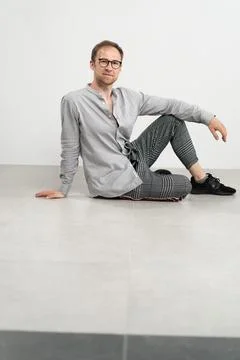 Man sitting on floor 写真素材