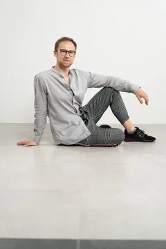 Man sitting on floor 스톡 사진