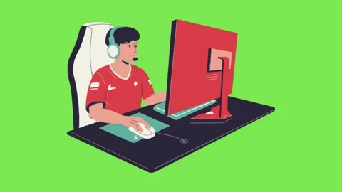 A man sitting in front of a computer is playing an online game Stock Footage 334517409