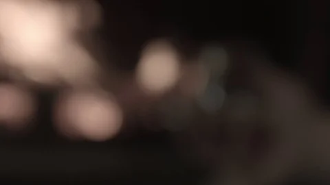 A man is sitting in front of a fireplace Stock Footage 74243734