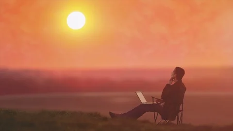 The man sitting with a laptop against the sunset background Stock-Footage 93244635