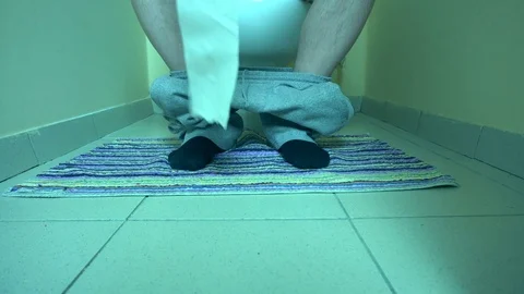 Man sitting on the lavatory Stock Footage 72110052