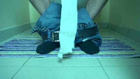 Man sitting on the lavatory Stock Footage 72110979