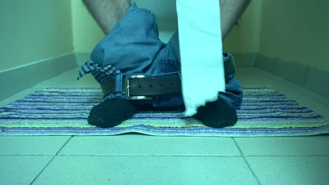 Man sitting on the lavatory Stock Footage 72110982