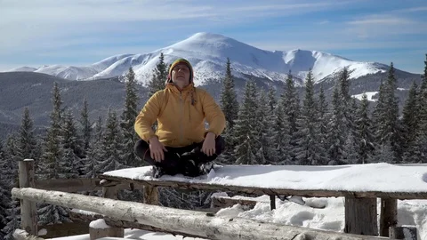 A man sitting in lotus posture Stock Footage 126911412